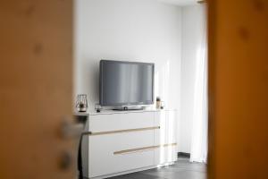 TV a/nebo společenská místnost v ubytování Chasa Fionas 265