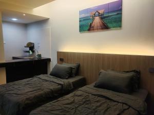 Postel nebo postele na pokoji v ubytování Hanan Studio Apartment with Pool, Wifi & Netflix