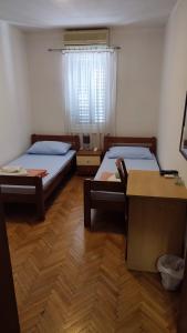 Postel nebo postele na pokoji v ubytování Jasna1