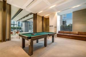 a billiard room with a pool table at Fantastic Views at Luxury Prima Pearl Tower in Melbourne