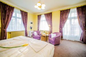 Postel nebo postele na pokoji v ubytování Hotel Veba