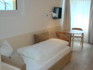 Postel nebo postele na pokoji v ubytování Hotel Restaurant Flaschen