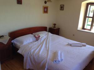 Posteľ alebo postele v izbe v ubytovaní STONE House "DAN"