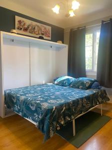 Un pat sau paturi într-o cameră la Villa entre la Provence et le Languedoc