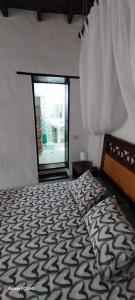 Postel nebo postele na pokoji v ubytování Suite casa rural Los Patios, CONIL + 4 fotografie