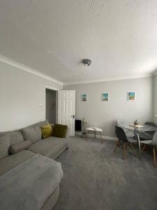 A seating area at Eaton Ford Green Ground Floor Apartment