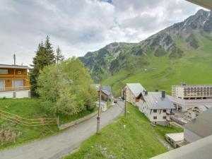 a view of a village with a mountain at Appartement La Mongie, 2 pièces, 7 personnes - FR-1-404-160 in La Mongie