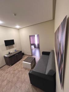 TV a/nebo společenská místnost v ubytování Bien hotel