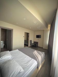 Postel nebo postele na pokoji v ubytování Bien hotel