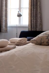 Postel nebo postele na pokoji v ubytování Várfal-Lak apartman