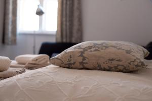 Postel nebo postele na pokoji v ubytování Várfal-Lak apartman