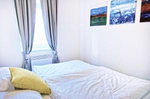 Postel nebo postele na pokoji v ubytování Lipno - Lakeside Village - Větrník