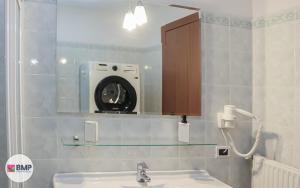 Koupelna v ubytování Bmp apartment Molveno Relax + 37 fotografií