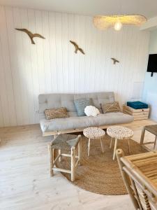 Posezení v ubytování Appart'Hôtel & Spa "Les Voiles" Le Ouessant + 12 fotografií