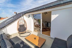 Balkón nebo terasa v ubytování *Luxus Penthouse* (Sauna, 6 Per)