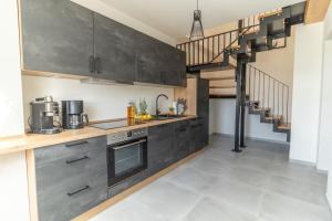 Kuchyň nebo kuchyňský kout v ubytování *Luxus Penthouse* (Sauna, 6 Per)