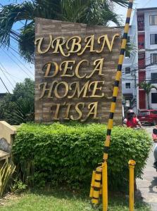 una señal de que la tasmanía de la casa profunda de readsurban en Cebu City Studio Condo Unit-WIFI-A/C-Hot Shower-(U302) en Cebú