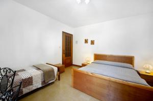 Postel nebo postele na pokoji v ubytování Maison Lorent