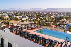 a view of the city from the roof of a house at Alina 203a @ Morgan Residences in Cabo San Lucas