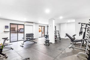a gym with several treadmills and tread machines at Alina 203a @ Morgan Residences in Cabo San Lucas