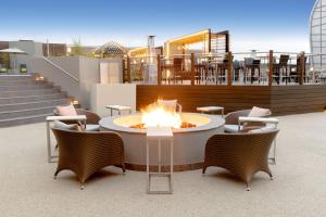 a fire pit sitting on top of a patio at Sandton Sun and Towers in Johannesburg