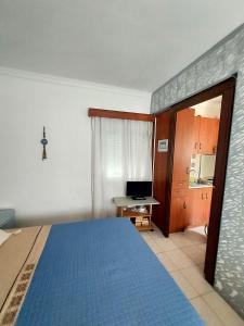 Postel nebo postele na pokoji v ubytování Anastasia's garden house