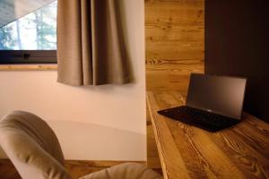TV a/nebo společenská místnost v ubytování Valgrisa Mountain Lodges 1