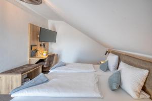 Postel nebo postele na pokoji v ubytování Hotel Schaider