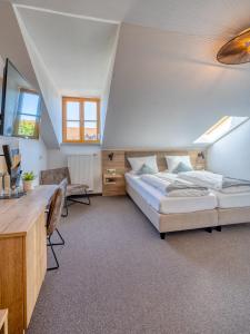 Postel nebo postele na pokoji v ubytování Hotel Schaider