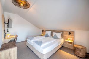 Postel nebo postele na pokoji v ubytování Hotel Schaider