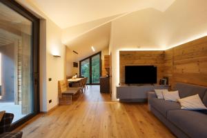 TV a/nebo společenská místnost v ubytování Valgrisa Mountain Lodges 1