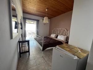 Posteľ alebo postele v izbe v ubytovaní La Casa D' Irene