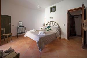 Voodi või voodid majutusasutuse Borgo di Conca toas