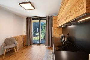 Kuchyň nebo kuchyňský kout v ubytování Valgrisa Mountain Lodges 2