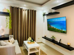 TV a/nebo společenská místnost v ubytování Apartamento Próximo Playa Caleta