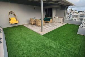 En hage utenfor Revanta Studio Flat