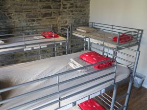 Cama ou camas em um quarto em Alt Hostel