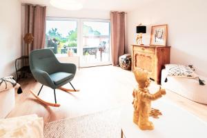 Ein Sitzbereich in der Unterkunft Ferienhaus Meergefühl