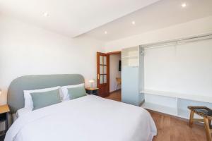 Postel nebo postele na pokoji v ubytování Equador Apartments by Olala Homes + 36 fotografií