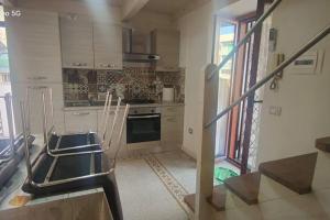 Nhà bếp/bếp nhỏ tại Pompei Casa Vacanza Priscus IV