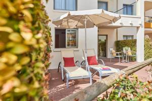 A patio or other outdoor area at Zafiro Tropic