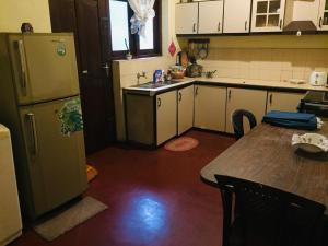 Kuchyň nebo kuchyňský kout v ubytování Galle Rest Home