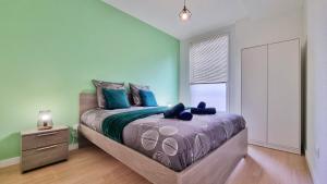 Posteľ alebo postele v izbe v ubytovaní La Résidence Évasion 2 - Original - Gare - Wifi - Relax BNB