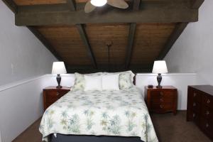 Postel nebo postele na pokoji v ubytování Papakea Resort G406 + 27 fotografií