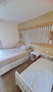 1 Schlafzimmer mit 2 Betten in der Unterkunft Taiba Beach Resort Térreo 2 quartos in São Gonçalo do Amarante