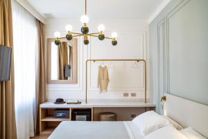 Voodi või voodid majutusasutuse Albergo Bianchi Stazione toas
