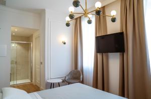 Voodi või voodid majutusasutuse Albergo Bianchi Stazione toas