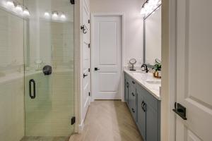 a bathroom with a shower and a sink and a mirror at Naples Retreat with Community Perks 6 Mi to Beach! in Naples