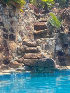 Bazén v ubytování Lime in de Coconut Villa nebo v jeho okolí