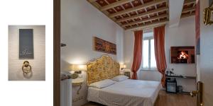 ローマにあるExcellent Trinity Roomsのベッドルーム(ベッド1台、窓付)